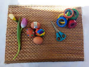 decorated eggs with adhesive tapes